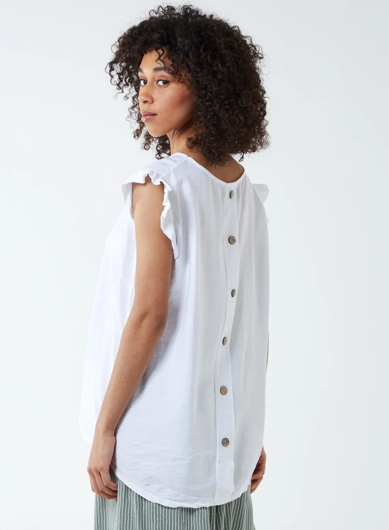 بلو فانيلا بلوزة بأزرار وكتف مكشكش