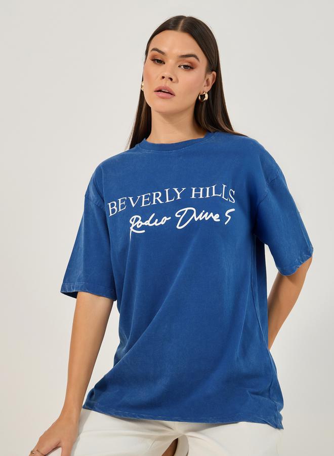 ستايلي تيشيرت بطباعة واسع بياقة دائرية وأكمام قصيرة - Image 1