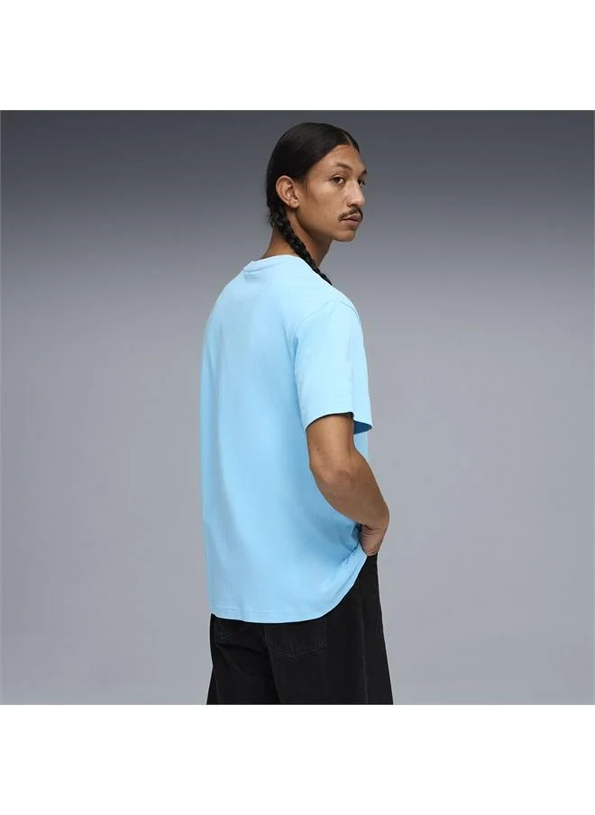 بوما تيشرت Essentials واسع ومزين بشعار PUMA Cat المطوّر للرجال