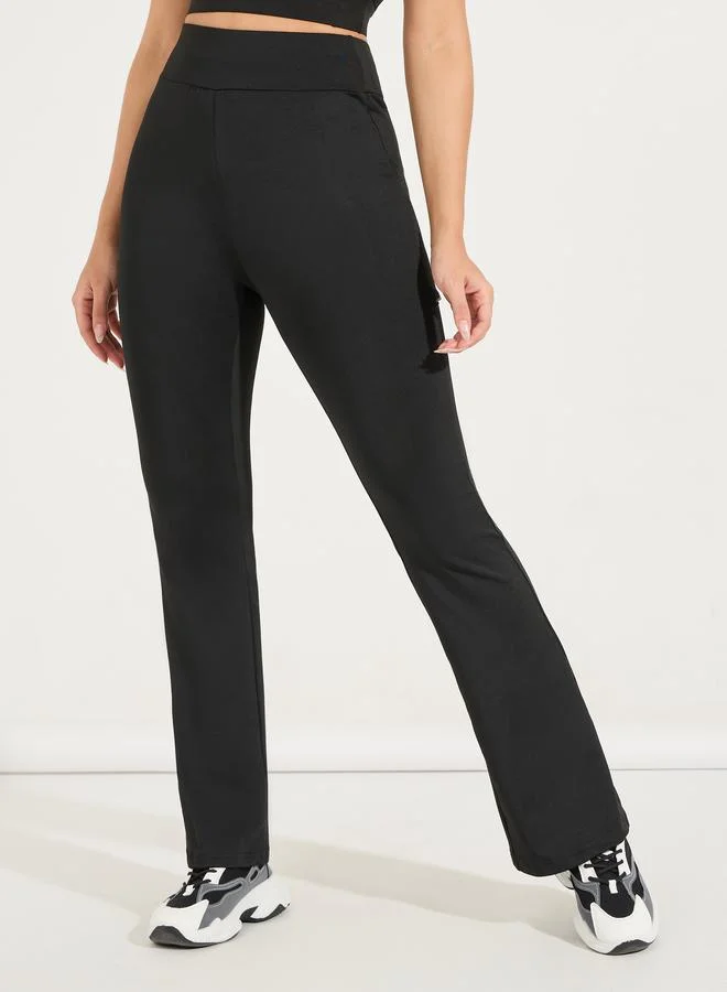 Styli Single Reflective Strip Pocket Detail Flared Leggings