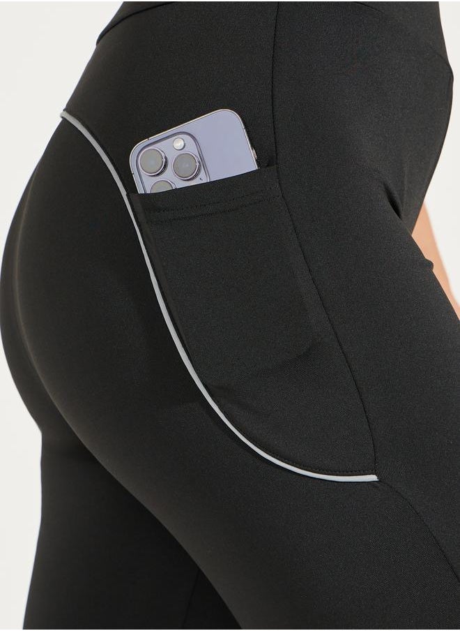 Single Reflective Strip Pocket Detail Flared Leggings - pzsku/ZEAEA6C1037C4FAC76A37Z/45/_/1730198115/cbfbbbcd-ef23-44d0-bdeb-5612111c5938