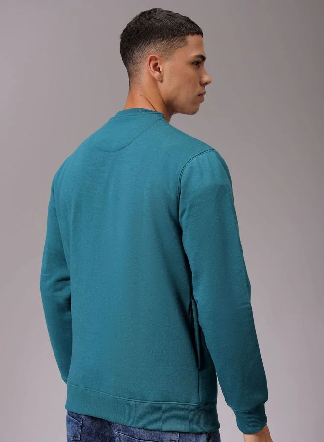 شركة المرآب الهندية Men Regular Fit Solid Crew Neck Overhead Sweatshirt