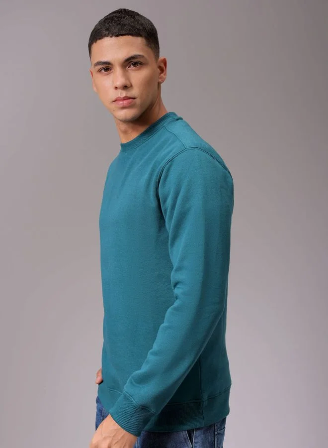 شركة المرآب الهندية Men Regular Fit Solid Crew Neck Overhead Sweatshirt