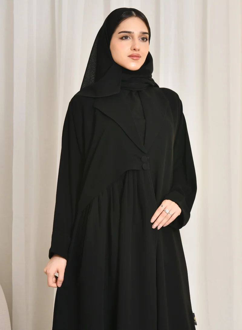 HAWRAA ABAYA Black abaya with a quarter-cloth blazer cut, side pleats and two button closures