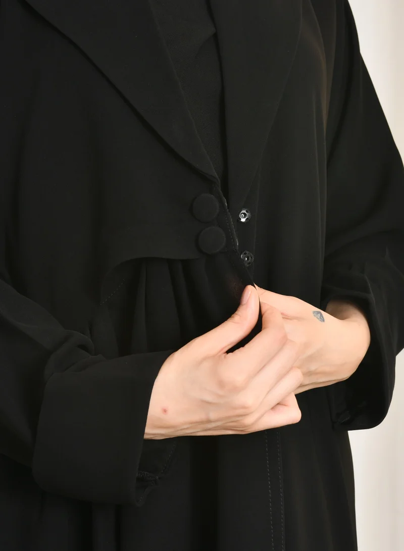 HAWRAA ABAYA Black abaya with a quarter-cloth blazer cut, side pleats and two button closures