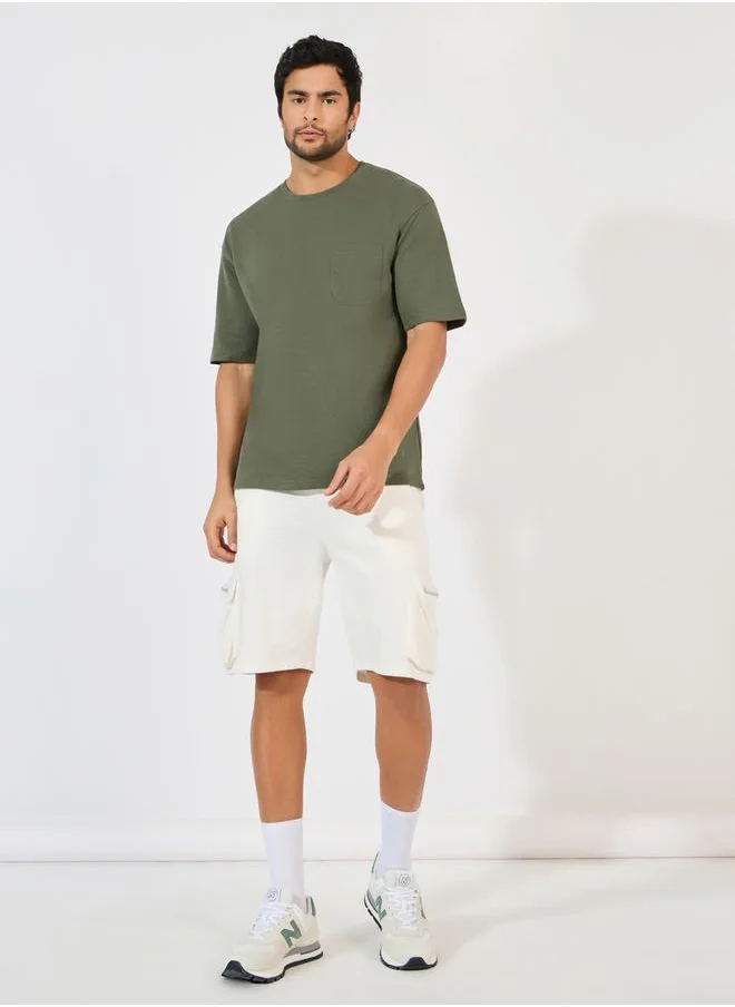 Styli Eco-Earth Terry Oversized T-Shirt with Patch Pocket