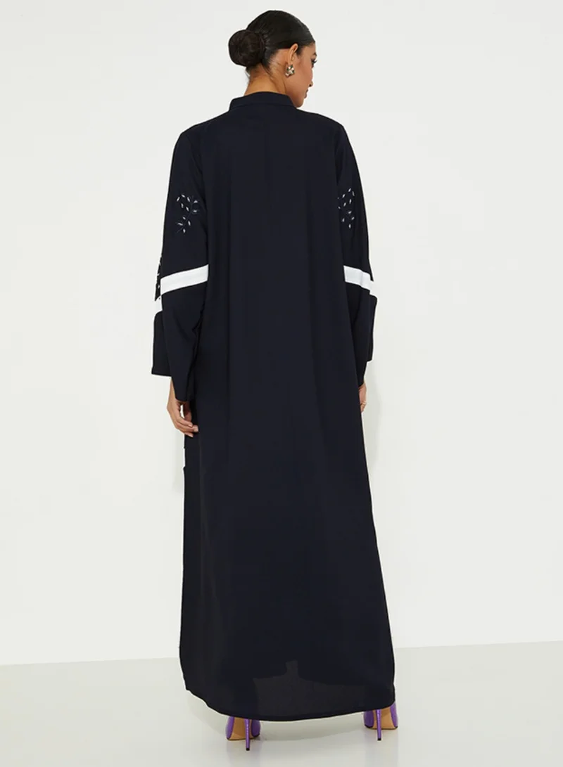 Rosette Abaya Navy abaya with white design and hand embroidery flower design