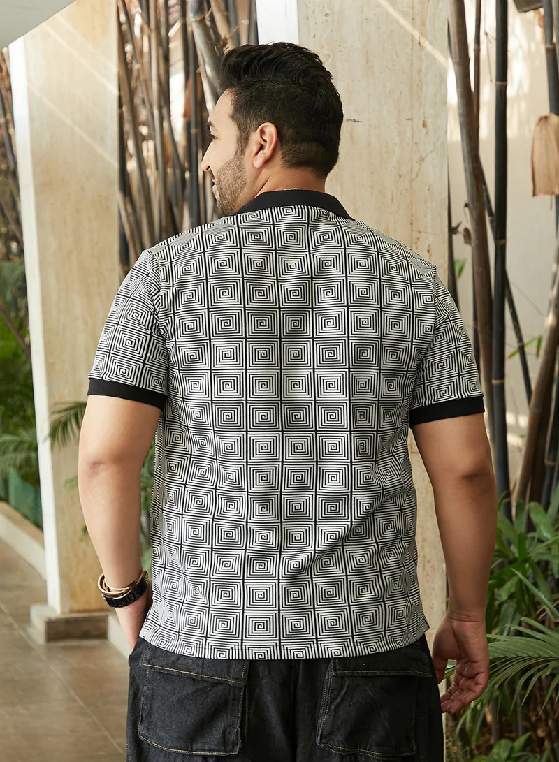 Instafab Plus Instafab Plus Men's Black & White Optical-Illusion Polo T-Shirt For Casual Wear | Polo Neck | Short Cuffed Sleeves | Half-Button Closure | Plus Size T-Shirt Crafted With Comfort Fit For Everyday Wear