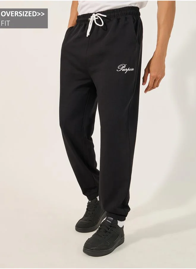 Styli Styli Minimal Slogan Print Oversized Joggers with Drawstring