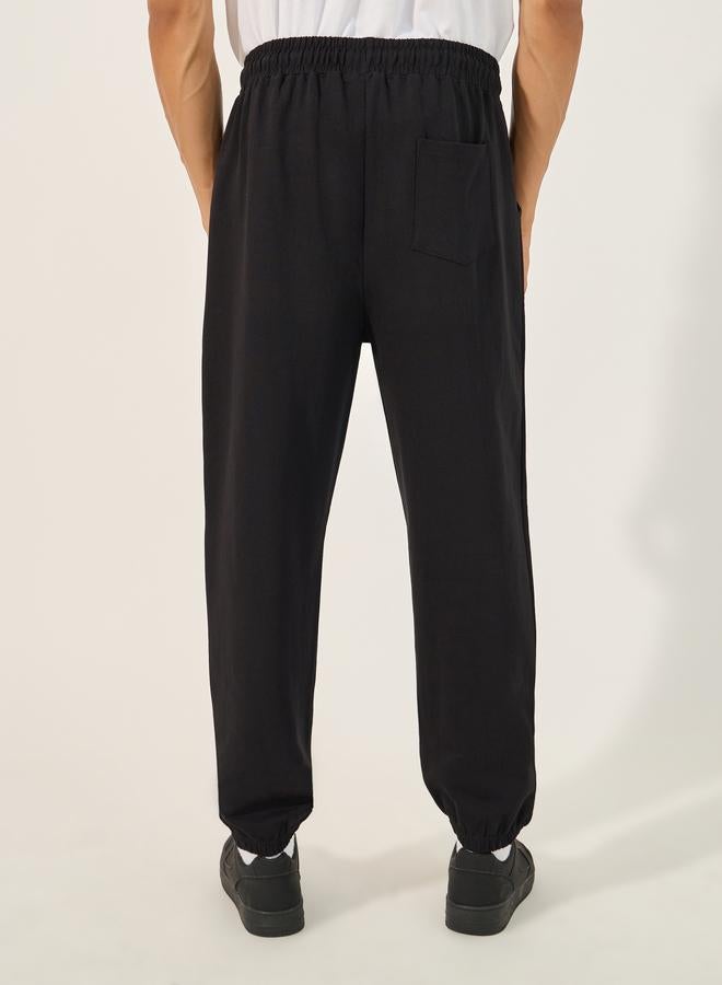 Styli Styli Minimal Slogan Print Oversized Joggers with Drawstring - Image 4
