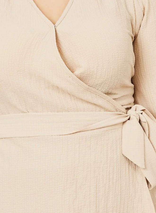 ستايلي Textured Peplum Wrap Top