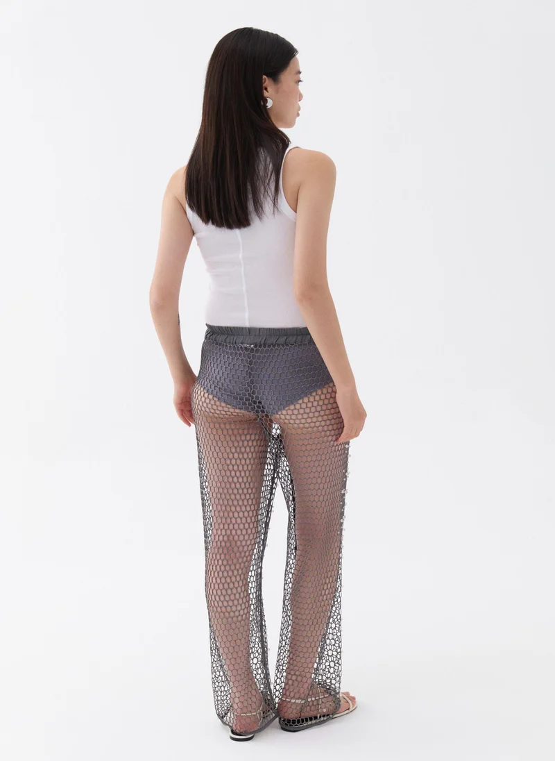 Nocturne Glitter Thread Fishnet Trousers