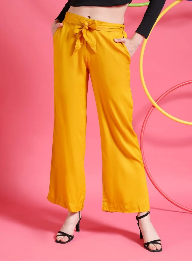 Women Flared Solid Mid-Rise Pants
