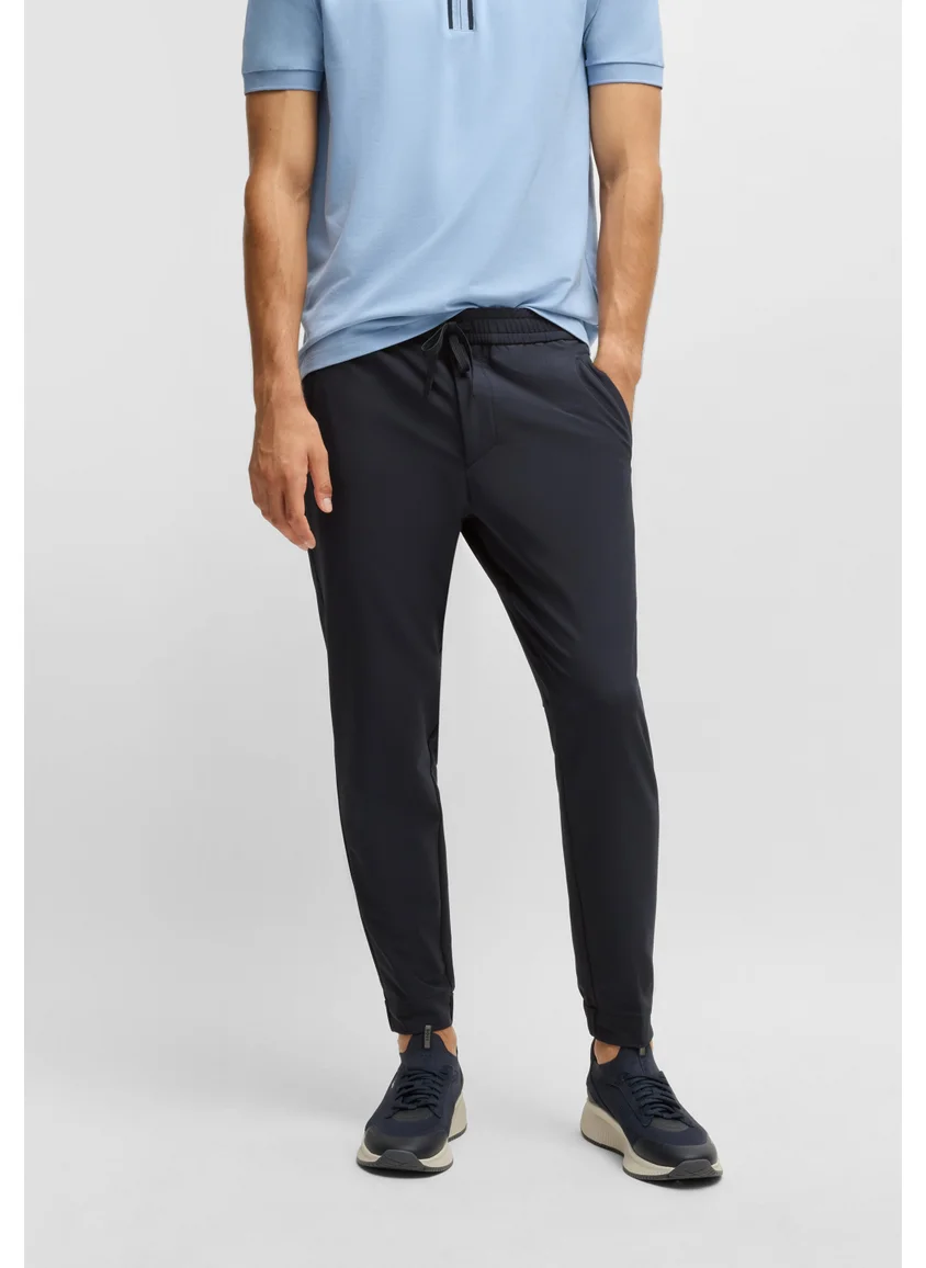 BOSS Tapered-fit trousers in water-repellent stretch fabric