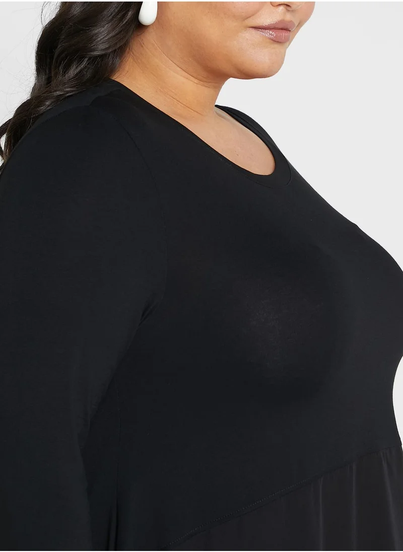 Avenue Crew Neck Asymmetrical Hem Top