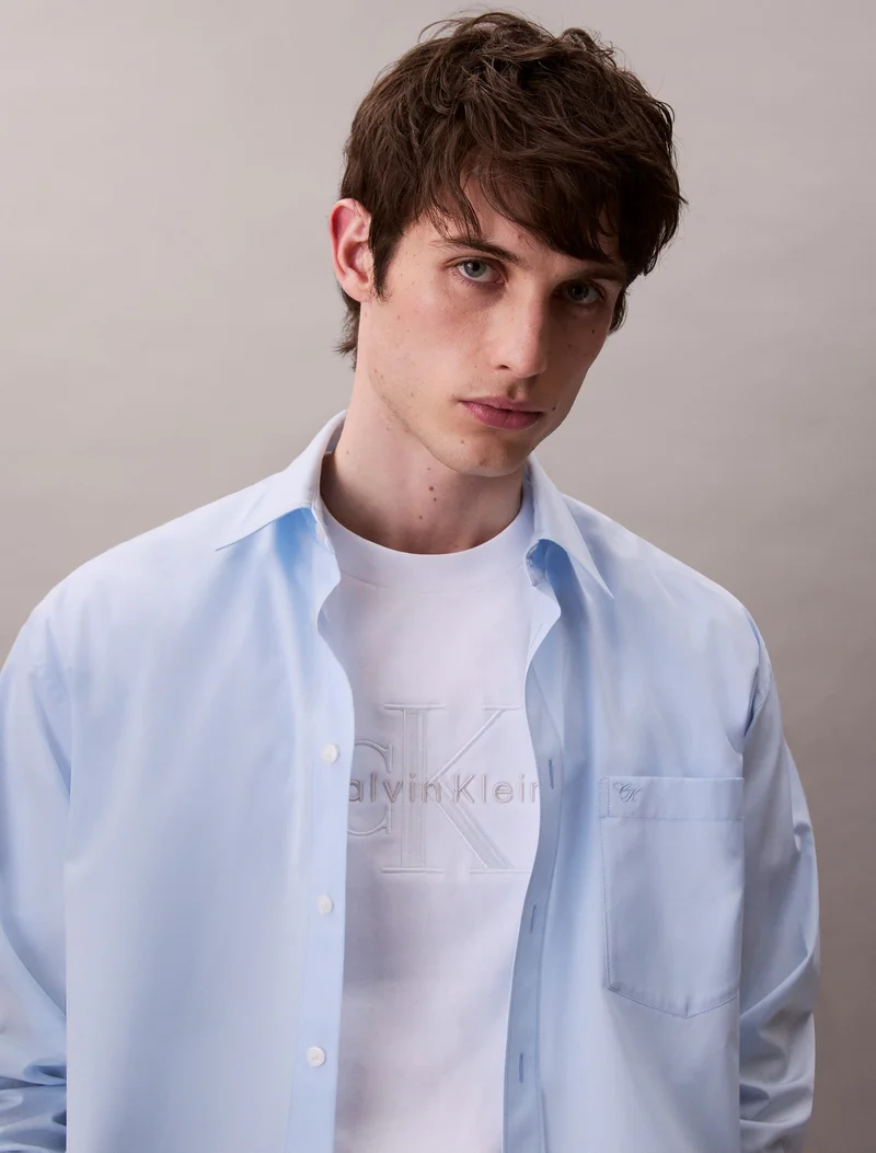 Calvin Klein Jeans Brilliant White Relaxed Monogram T-shirt for Men | Best Price UAE
