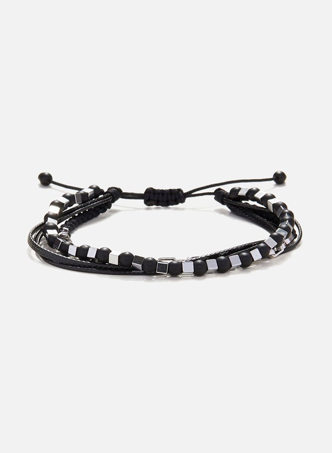 CHRYSOSTOMOS Handmade Adjustable Beaded Multi-Line Bracelet with Onyx, Squared Hematite, Cords and Braided Chain - Image 1