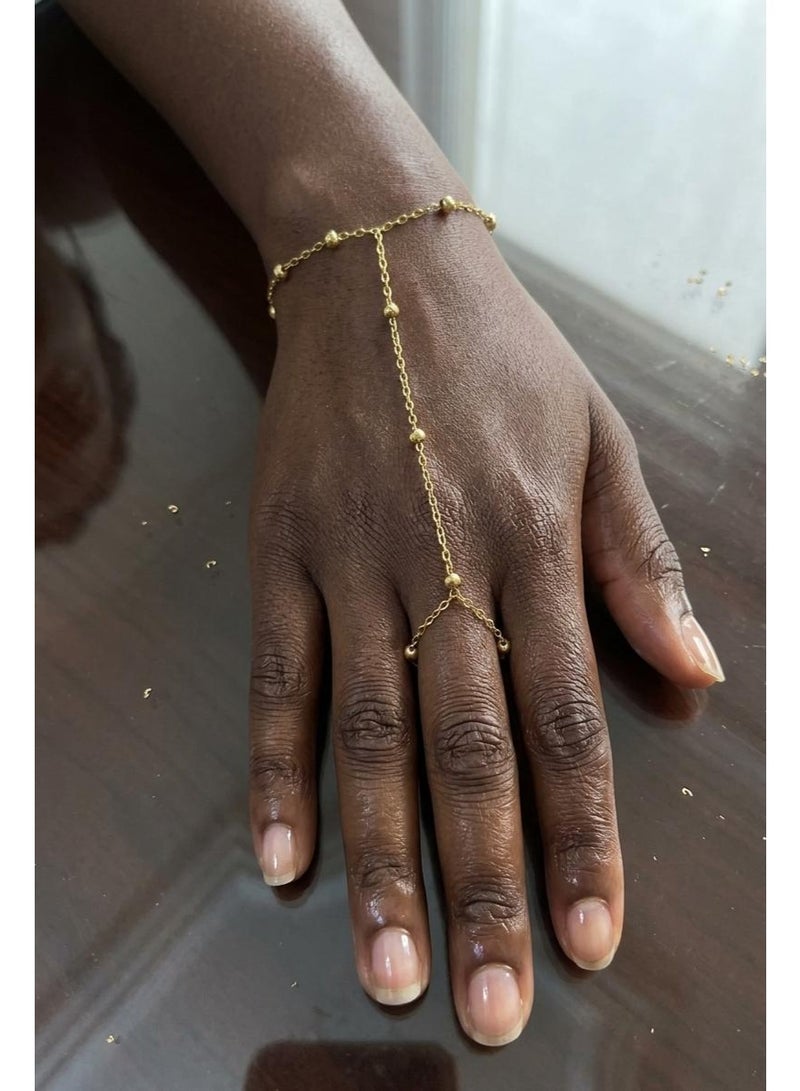 Luxuria Hand Chain Ring: A modern accessory that combines a bracelet and a ring into one piece connected by a thin chain. - Image 3