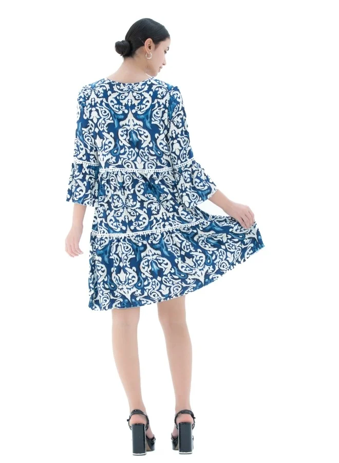 HaILYS A stylish tiered dress with blue and white print, perfect for breezy summer days.