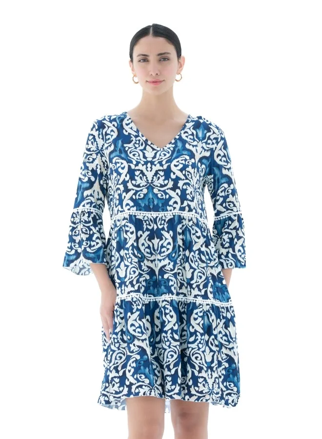 HaILYS A stylish tiered dress with blue and white print, perfect for breezy summer days.