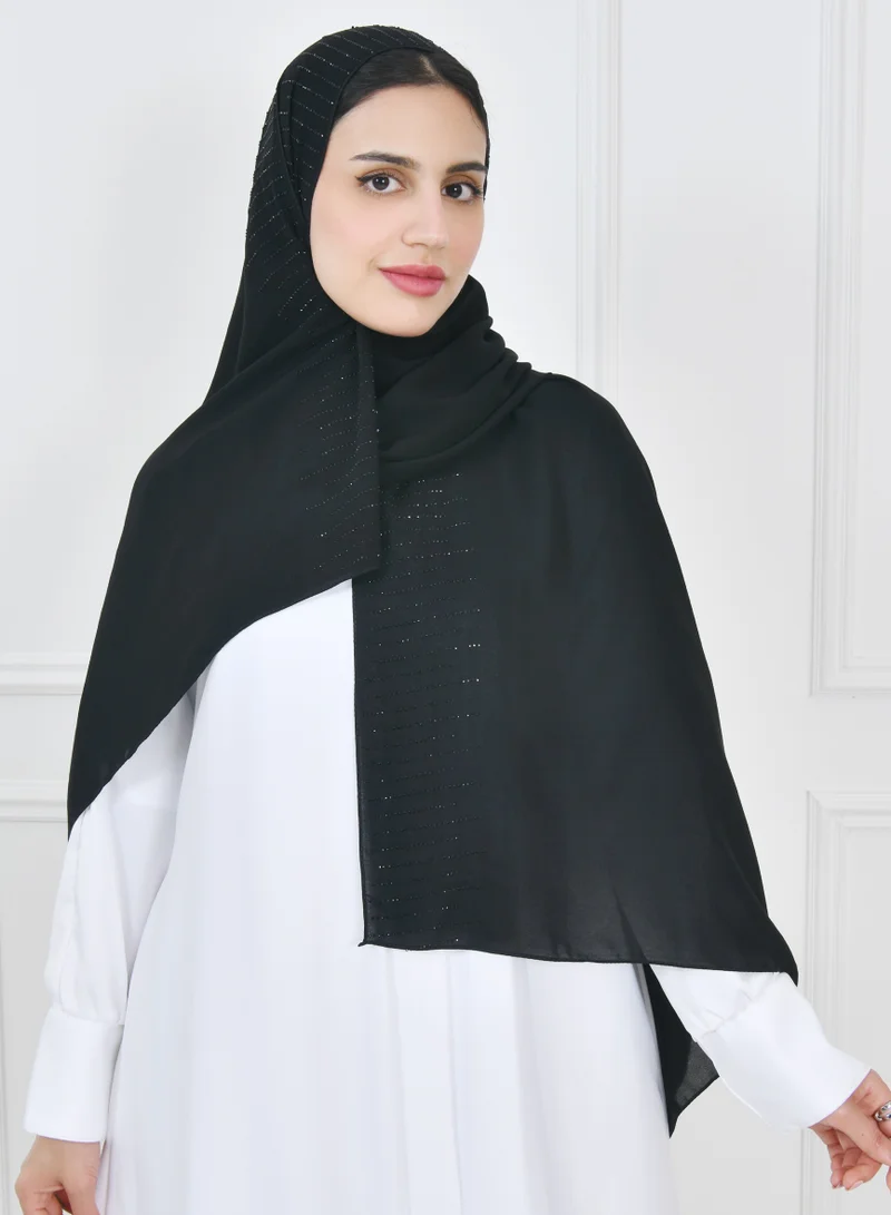 HAWRAA ABAYA A silk veil with an edge decorated with black crystals