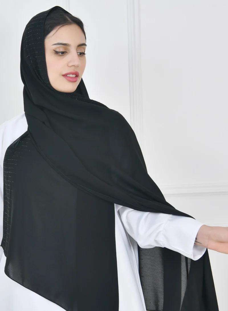 HAWRAA ABAYA A silk veil with an edge decorated with black crystals