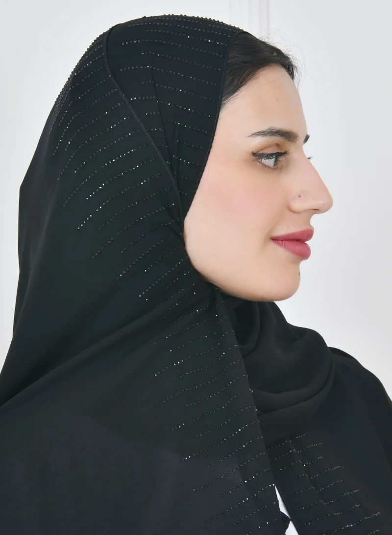 HAWRAA ABAYA A silk veil with an edge decorated with black crystals