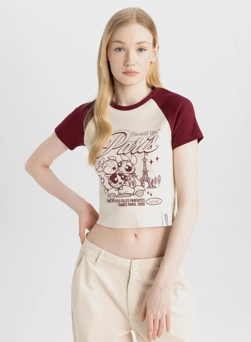 ديفاكتو كاميسول بطبعة فتيات القوة بقصة ضيقة