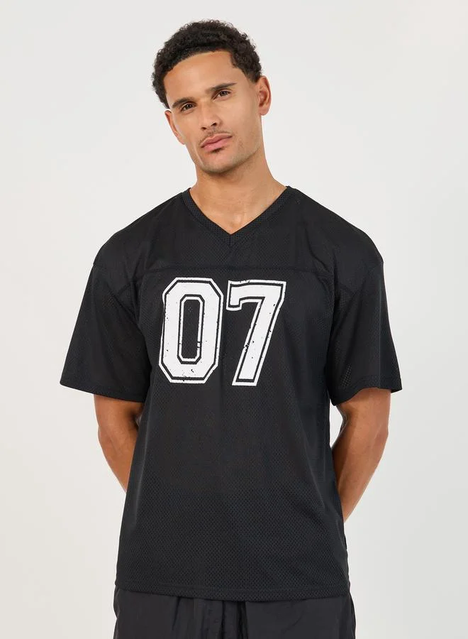 Styli Active Varsity Print Stretch Oversized T-Shirt with Seam Detail
