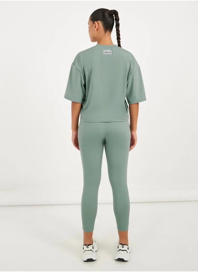 ستايلي Gymspire Edition - Label Ruched Waist 7/8 Leggings