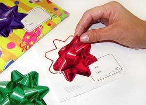 Gadjit Holiday Bow Stickers Pack of 50 Bows 3D Image Stickers that Look like Poly Bows with Tags Bows Wont Crush like Poly Bows Great for Shipping Gifts - Image 1