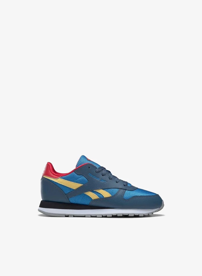 ريبوك Shop the Reebok x DC Superman Classic Leather youth shoes — hero-inspired colourways on the iconic leather silhouette. Kids' sneakers in UAE. Free delivery over AED 250.