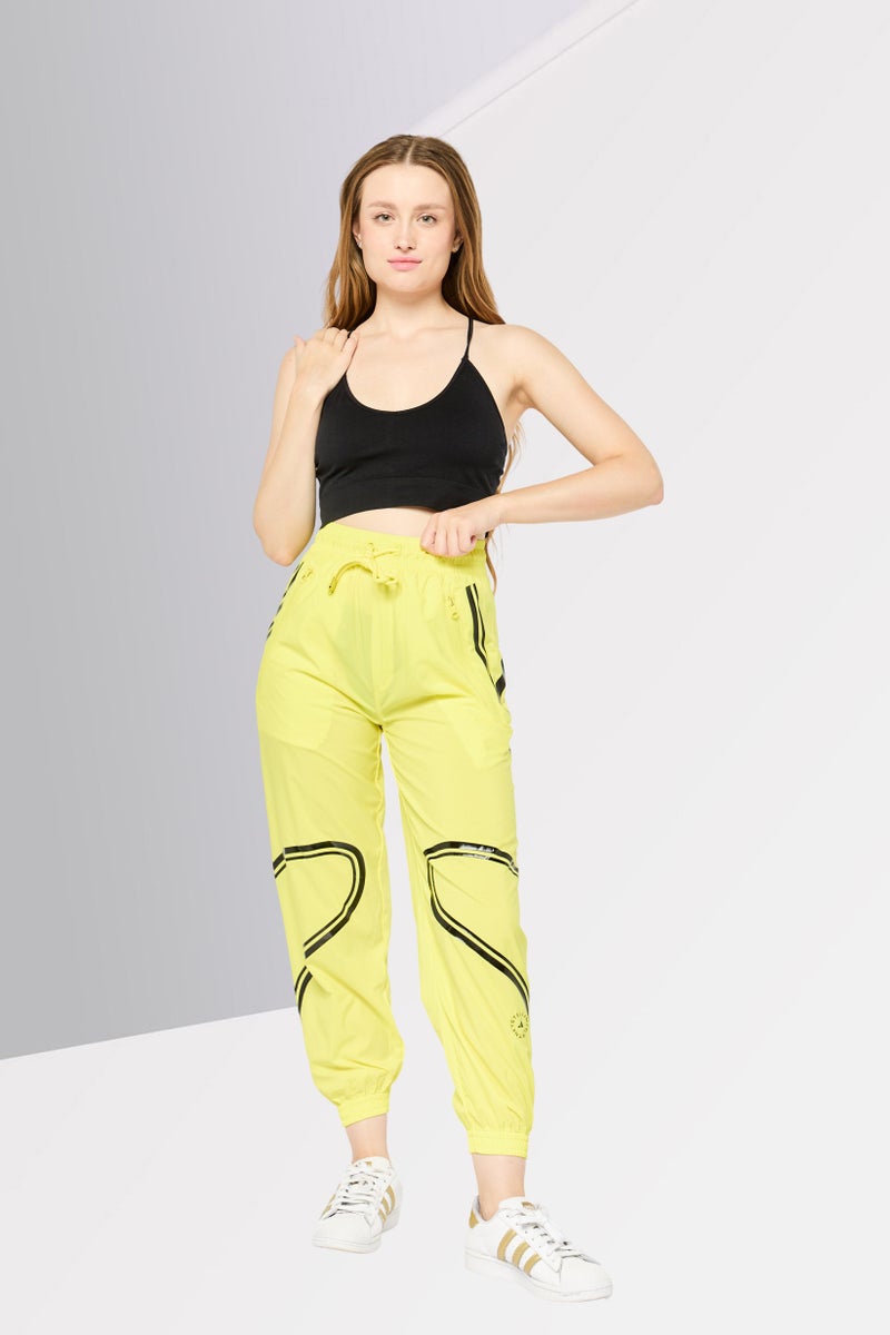 Adidas سروال رياضي نسائي من أديداس بتصميم ستيلا مكارتني، أصفر - Image 2
