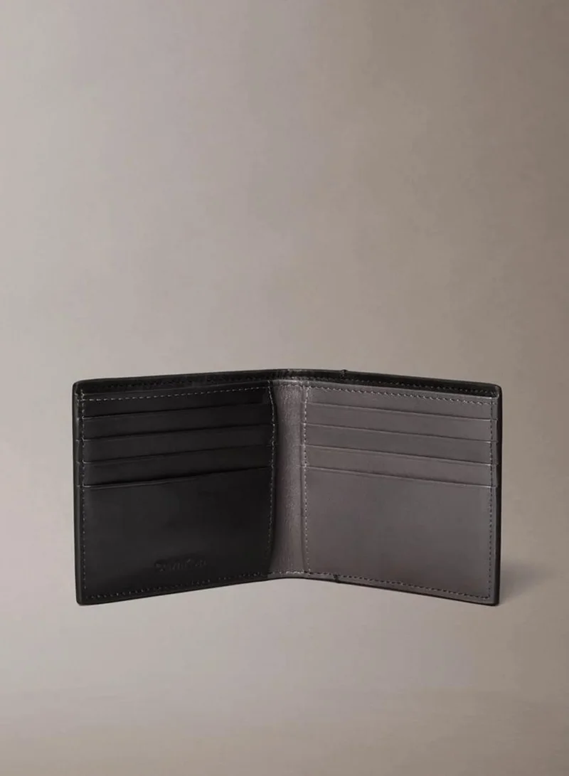 Calvin Klein Black Embossed Logo Leather Billfold Wallet for Men | Best Price UAE