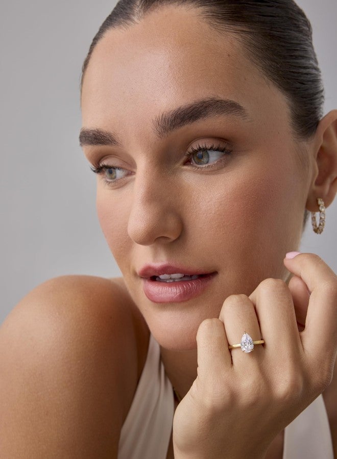 PAVOI 14K Yellow Gold Plated Simple Eternity Band with 2.5CT Pear Cubic Zirconia Hidden Halo Bridal Wedding Promise Engagement Ring for Women - Statement Ring - Size 7 - Image 4