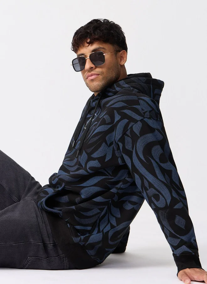 The Souled Store  The Souled Store Men's Oversized Fit Black Printed Hoodie with Embroidery  | Best Price UAE