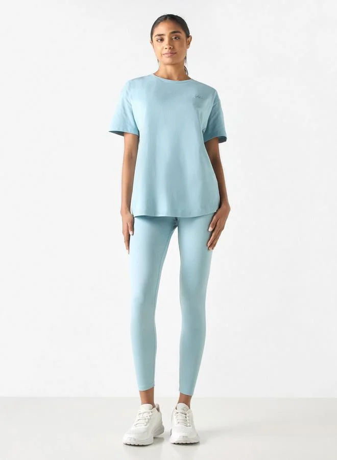 كابا بنطلون ليقنز بخصر مطّاطي وطبعات شعار من كابا