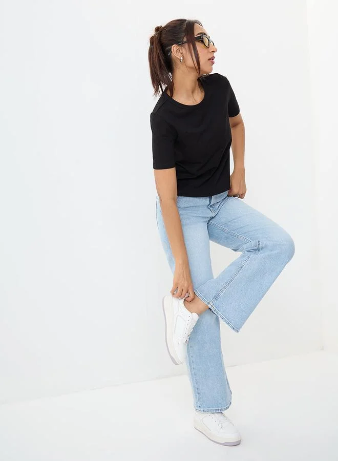 Femmella Black Solid Round Neck Short Sleeves T-Shirt