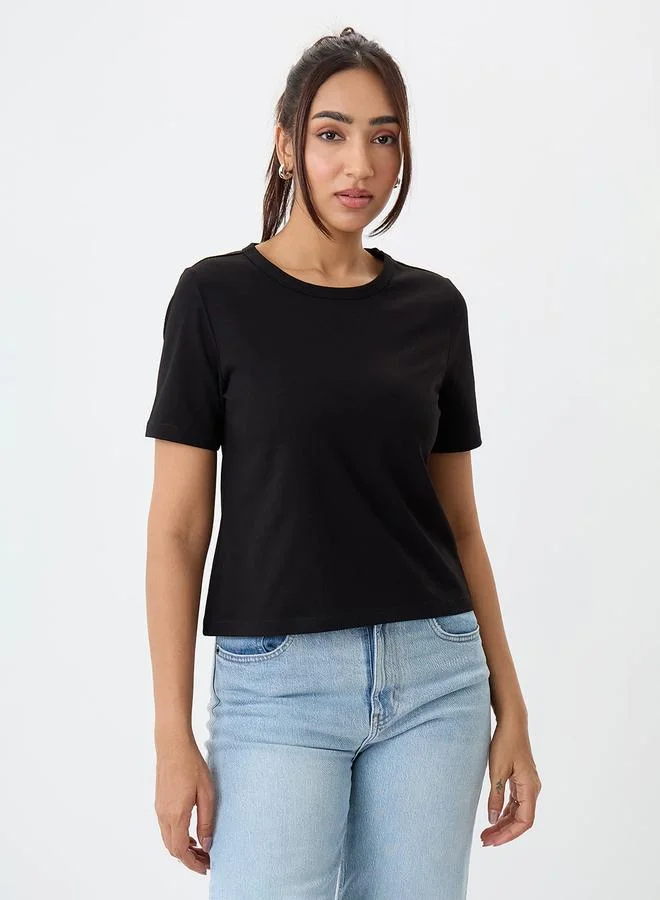 Femmella Black Solid Round Neck Short Sleeves T-Shirt