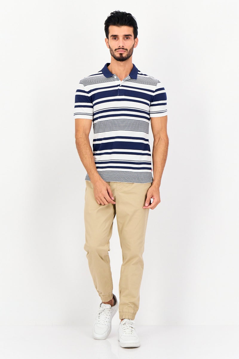 Levi's قميص بولو بأكمام قصيرة للرجال بتصميم عادي، مخطط، متعدد الألوان - Image 2