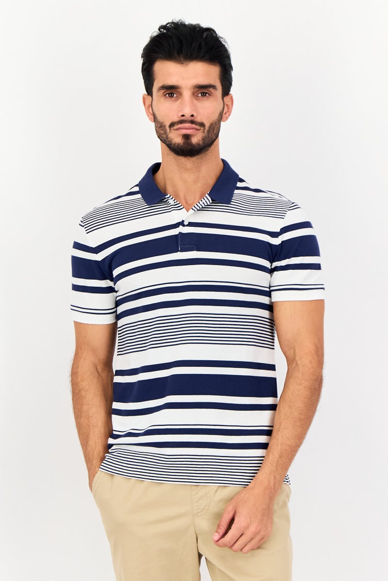 Levi's قميص بولو بأكمام قصيرة للرجال بتصميم عادي، مخطط، متعدد الألوان - Image 1