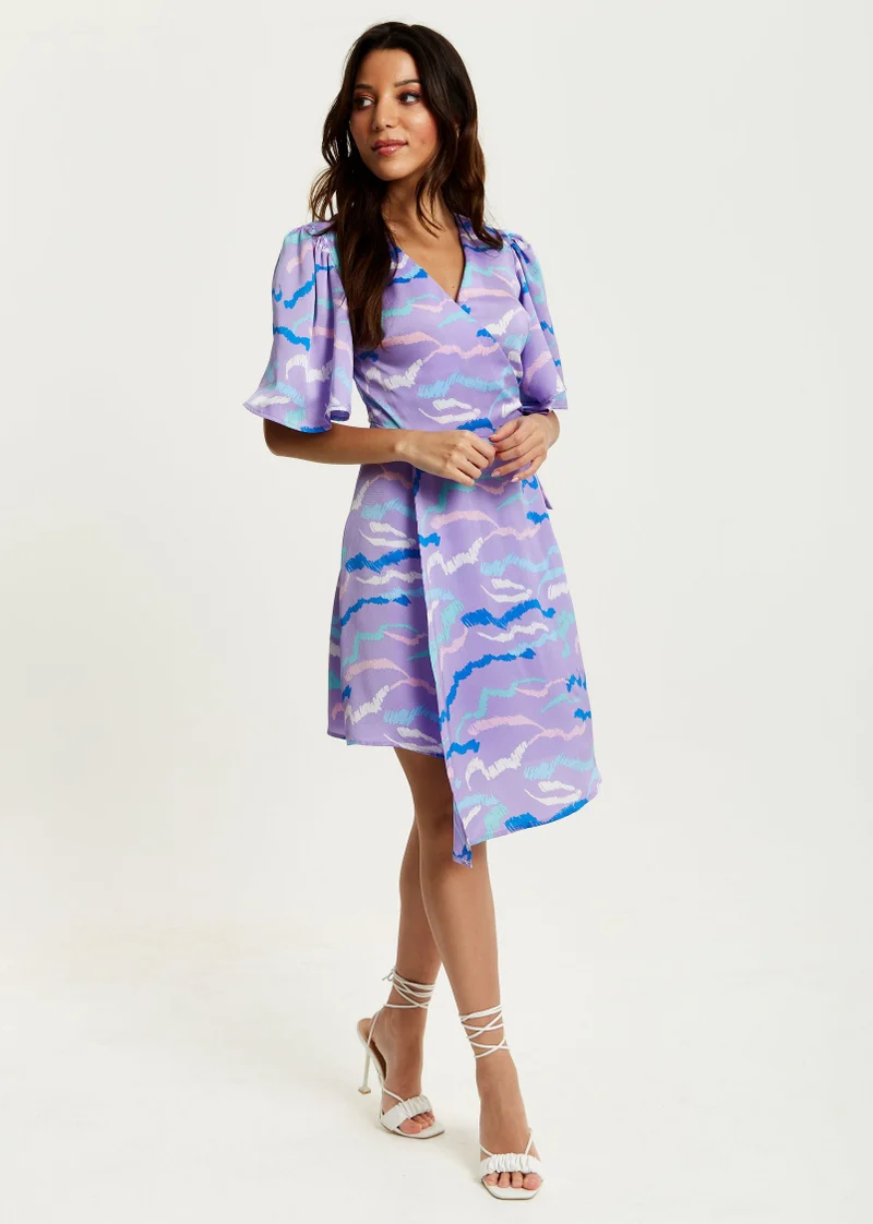 Liquorish Mini Abstract Print Wrap Dress In Lilac