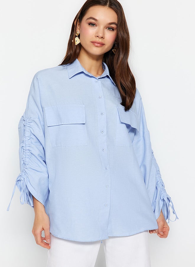 trendyol Light Blue Woven Shirt with Adjustable Gathering Detail on Sleeves TCTSS23TG00011 - Image 1