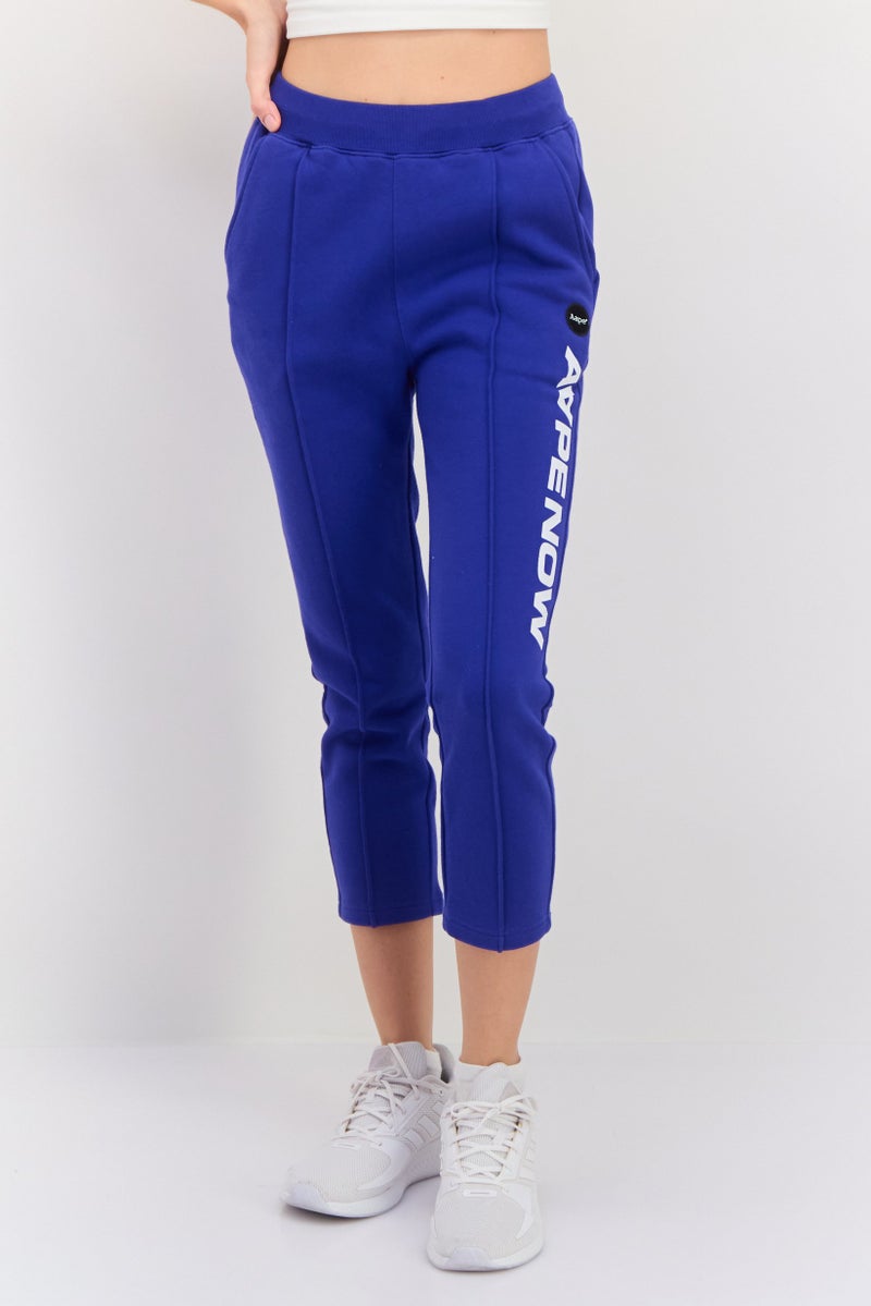 Aape By A Bathing Ape سروال رياضي مطبوع برسومات للنساء، أزرق - Image 1