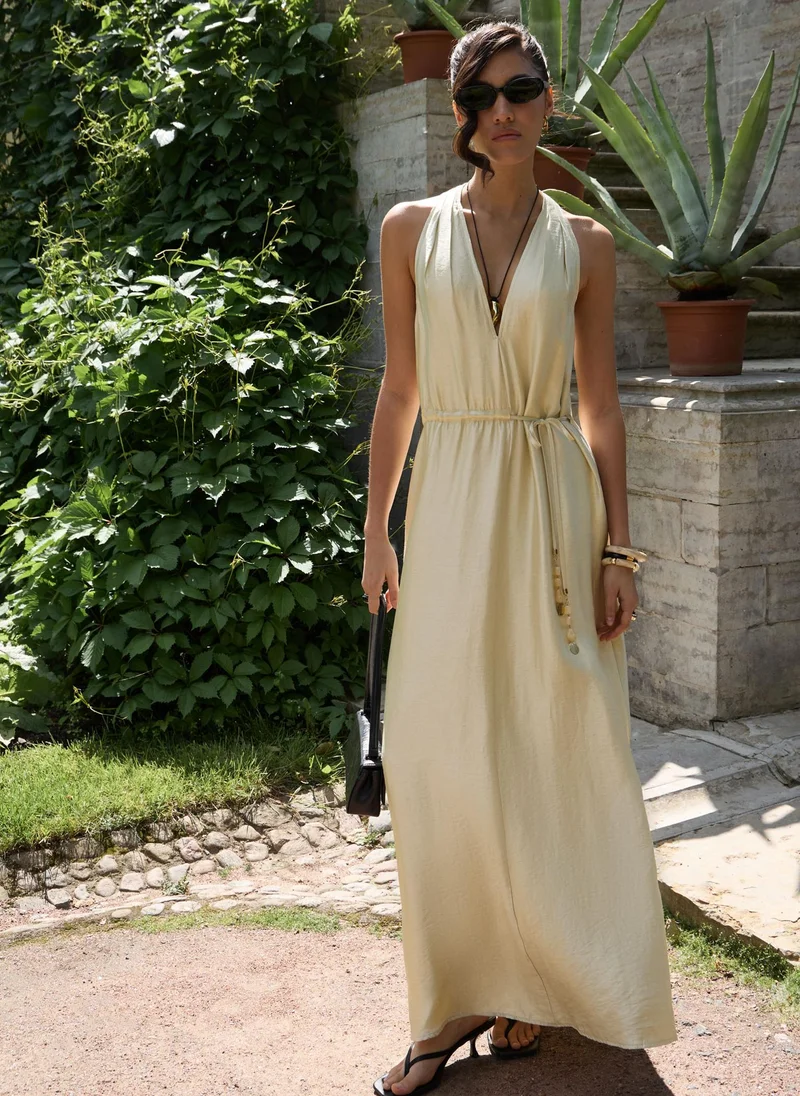 Maxi dress with draped back and waist ties