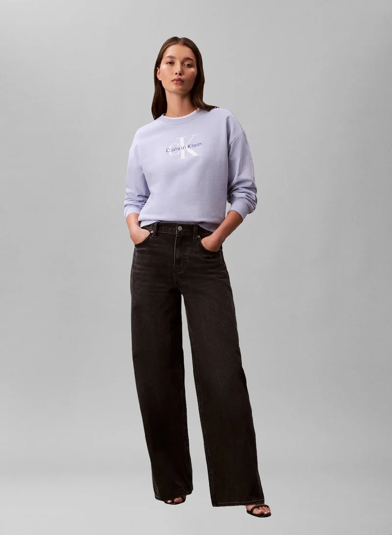 كالفن كلاين جينز كنزة من التيري الفرنسي بقصّة مريحة وشعار