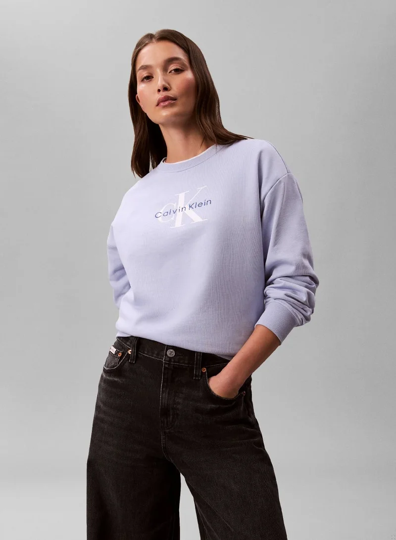 كالفن كلاين جينز كنزة من التيري الفرنسي بقصّة مريحة وشعار