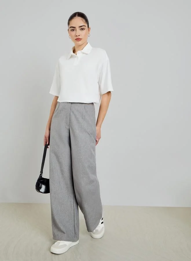 ستايلي تيشيرت بولو محبوك بأكمام قصيرة