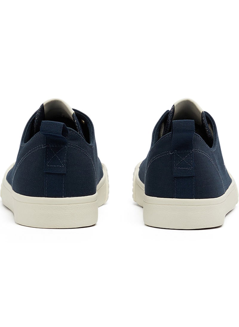 Men's Navy Low-Top Canvas Sneakers - Iconic Branding for a Clean Look - pzsku/ZEBD567515320093C1D63Z/45/_/1740736406/b2f0c6ce-c81d-4a4b-b410-4927cdf3852c