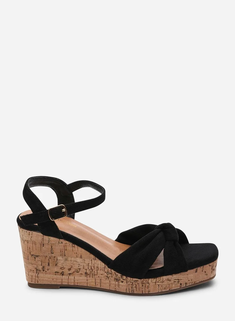من أين هذه Mystique Platform Knot Detail Black Suede Wedge